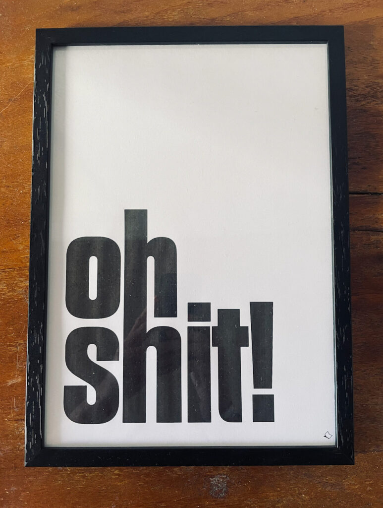 wandbild mit Schriftzug oh shit in schwarz